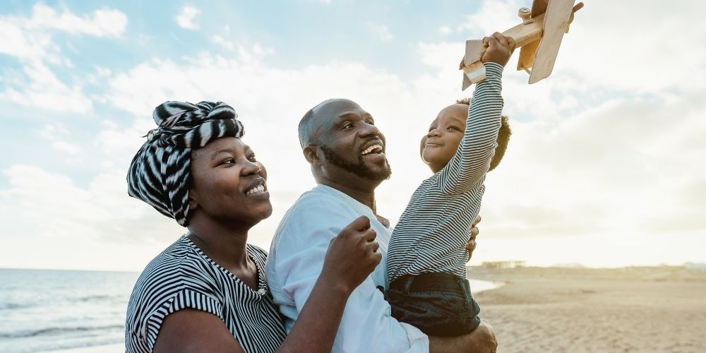 A happy family on the beach.