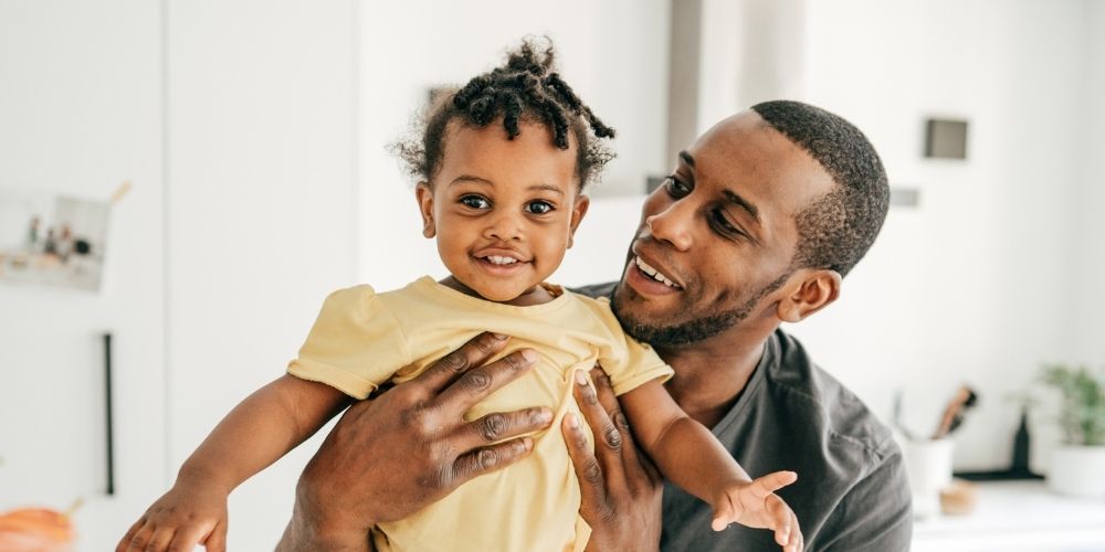 Dad with his happy daughter.